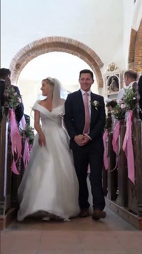 Bride and Groom Walk up the aisle