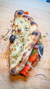 28K views · 63 comments | Lox Pizza Sandwich with dill cream cheese, hash browns, tomatoes, smoked Alaskan salmon, capers, red onions, and fresh dill. I don’t make this often, but I wanted to give it a try—it was absolutely delicious, especially on the everything sourdough crust baked in my @gozney dome #lox #pizzasandwich #sandwich #sandwiches | Seanspizza | Facebook