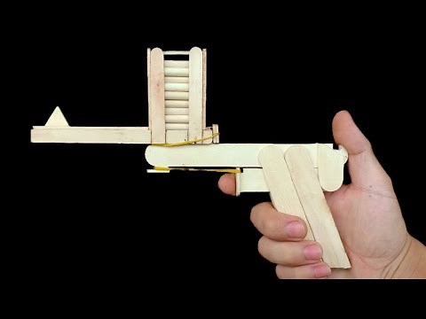 How to make a gun with ice cream sticks or popsicle sticks at home | how to make a rubber band gun