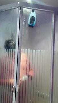 Boy singing in shower