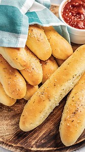 4.1K views · 36 reactions | Soft, chewy homemade breadsticks brushed with buttery garlic perfection. Ready in under 90 minutes with or without a stand mixer. https://thestayathomechef.com/breadsticks/ | Recipes | Facebook