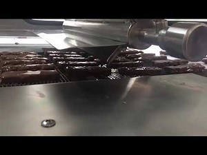 Chocolate coating machine