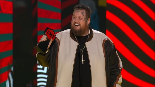 1.2M views · 16K reactions | Shining the spotlight on Jelly Roll! He just won #CMTAwards Performance of the Year!! ⚡ | CMT | Facebook