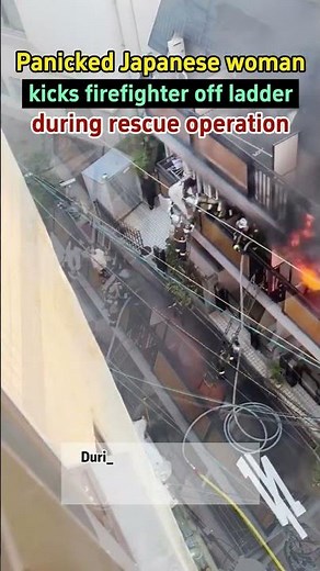 【Panicked Japanese woman kicks firefighter off ladder during rescue operation】
