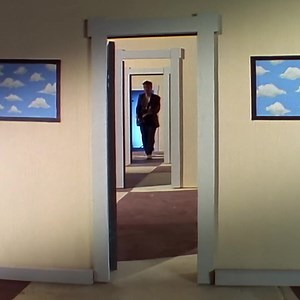 The "Hourglass" music video features bendy instruments, a fish-phone, and all sorts of visual and camera trickery. Remind yourself of the height of '80s music videos with a watch at https://youtu.be/dpc8uZtKn7A | Squeeze