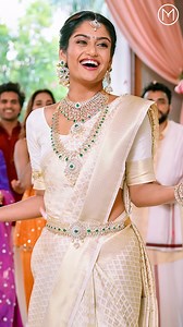 It’s hard to tell what makes the bride look so divine. Is it her face that's beaming with joy? or the precious Jewellery that makes her sparkle? She adores all the frills and traditions and wants to showcase her personality to the maximum. #MakeWay #MakeWayForTheBride #BridalJewellery #MalabarBrides #MalabarGoldandDiamonds #Indianweddings #WeddingSeason #Indianjewellery #Indianweddingjewellery #Malabar #BridesOfIndia | Malabar Gold and Diamonds