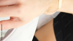 Laser hair removal procedure. Woman doctor cosmetologist with the help of machine depilation.