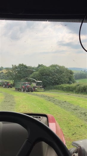 Tractor Operations: Grass Cutting and Collection in the Field