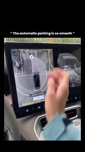 Credits to the rightful owner. DM for credit or removal. • The video shows an advanced automatic-parking system, similar to the one used in modern vehicles like the Denza N9, where the car uses a network of cameras, ultrasonic sensors, and radar to map its surroundings in real time. The top-down 360° view displayed on the screen is created by stitching together feeds from multiple wide-angle cameras placed around the vehicle, allowing the system to measure distances, detect obstacles, and calcul