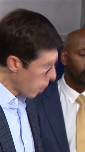 Police in Rhode Island said early Sunday that they had a person of interest in custody after a shooting that rocked the Brown University campus during final exams, leaving two people dead and nine others wounded. Col. Oscar Perez, chief of the Providence police, confirmed at a news conference that the detained person was in their 30s and that authorities are not currently searching for anyone else. He declined to say where the person was arrested and whether the person was connected to the unive