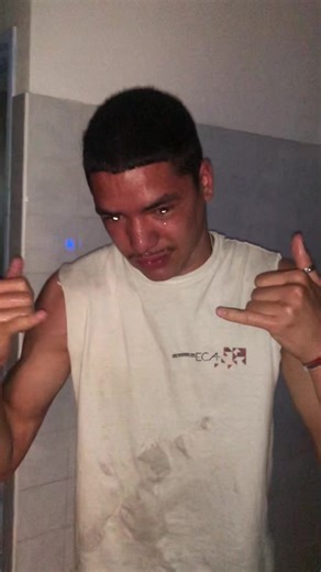 Young Men Enjoying Casual Moments in Tiled Room