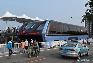 China Built The Crazy Traffic-Straddling Bus, It's Ginormous