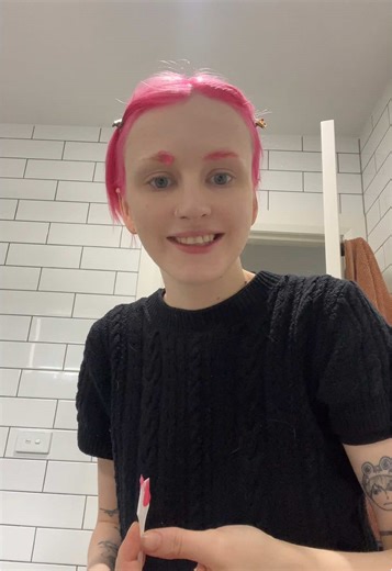 Transform Sadness with Pink Hair and Eyebrows