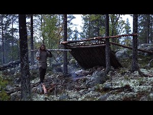 Bushcraft trip - shelter building, boat down river, reindeer skin, meat