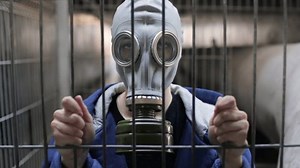 Girl Gas Mask Standing Behind Bars Stock Footage Video (100% Royalty-free) 1100782385 | Shutterstock