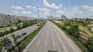 Above View of Highway With Vehicles Moving At Day Time