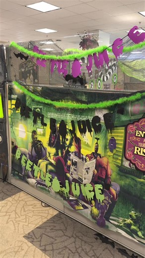 It’s showtime…at the office 💚💜 #Halloween #Beetlejuice #Workflow | Dora Tenorio