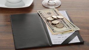 The Most Common Fees You'll See On A Restaurant Bill (And What They Mean) - The Takeout