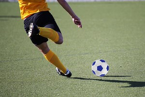 Clip Of A Soccer Player Drilling Two Opponents In The Face With A Ball Has Everyone Laughing
