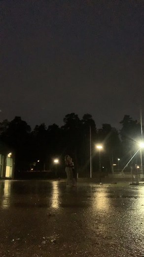 Friends Hugging in the Rain: Heartwarming Aesthetic Moment