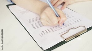 Intellectual property assignment agreement, hand fills out a document, legal procedure, author's rights, safeguard