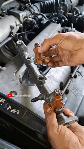 Install Injectors on Fuel Rail #automobile #mechanic #engineering