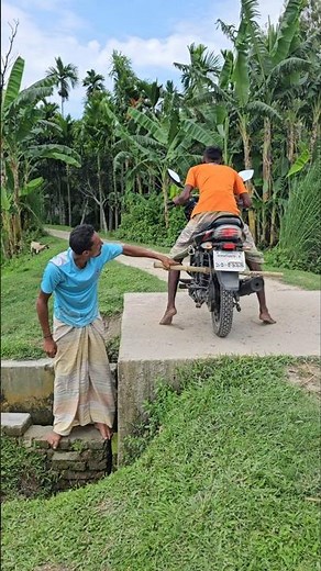 Isn't the man pushing the bike forward?