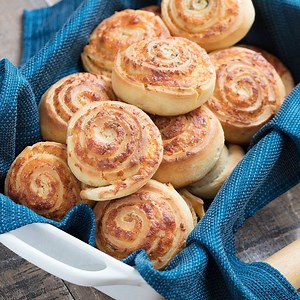 These CHEESE ROLLS are made with soft, pillowy homemade roll dough and stuffed with ooey gooey cheese and savory spices. They're the perfect compliment to a bowl of hot soup. RECIPE HERE: http://www.thecraftpatchblog.com/2012/01/savory-cheese-rolls.html | The Craft Patch