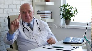 Confident Medical Person Making No Hand Sign a Warning Gestures