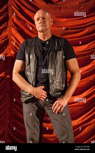 Actor Michael Rooker appears at a press conference announcing the new Illinois Department of Transportation's new safety campaign. The Talking Dead video series features Michael Rooker and the trailer was showcased during the presentation on Thursday, Aug 21, 2014 at the Music Box Theatre in Chicago. (Photo by Barry Brecheisen/Invision/AP Stock Photo - Alamy