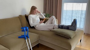 Woman Leg Cast Browsing Phone Living Stock Footage Video (100% Royalty-free) 3659268693 | Shutterstock