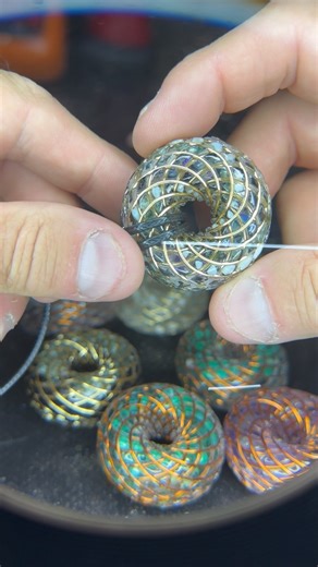 Jason Young Stiles on Instagram: "Take a closer look at our brand-new iTorus iZ—captured under the magnifying glass! Witness the precise craftsmanship and sacred geometry that power this revolutionary device. With every curve and coil, the iTorus iZ harnesses energy, resonance, and quantum technology to elevate your wellness journey. Curious to learn more? Drop a comment or DM us for details, and discover how iPyramids is transforming the way we experience healing and energy alignment. Stay tune