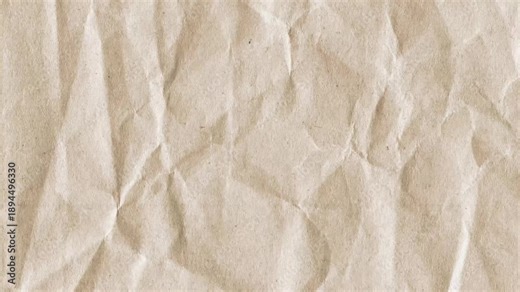 Wrinkled brown kraft paper texture background for vintage design, organic craft projects and creative overlays.
