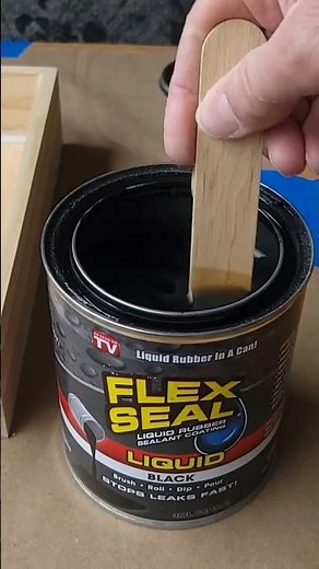 Applying Flex Seal liquid rubber to wood box water fountain reservoir