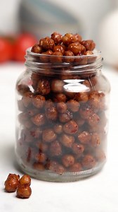 These Crispy Baked BBQ Chickpeas are a great, healthier alternative to crisps! 🌱 They're super simple to make and are undoubtedly delicious. Just dry roast your chickpeas for 10 minutes, then cover them in our organic BBQ Sauce before roasting again until crispy - about another 20 minutes. Top Tip! Clean and dry your chickpeas jar and use it to store your BBQ chickpeas to keep them fresh. Click the link for the recipe https://bit.ly/3vtG8eX | Biona