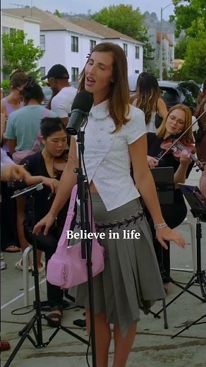 Ella Rosa covered "Believe" by Cher (with strings) live on Melrose Ave in Los Angeles.