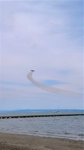 Extra 300 acrobatic airplane drifting sideways making a turn only with rudder