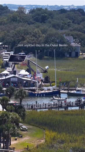 🏝️ Just another day in the Outer Banks Looks like the Outer Banks (OBX) show is filming right here on Shem Creek 🎥🌊. Even though the Netflix series is set in the Outer Banks of North Carolina, much of the production actually happens in Charleston, SC. Shem Creek and the Old Village area of Mount Pleasant are some of the most popular spots thanks to the boats, docks, and sweeping Lowcountry marsh views. When you see shrimp boats, creeks, and waterfront restaurants featured in the series, there