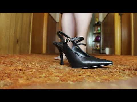 Work outfit complete with gray pencil skirt hosiery and sling back heels