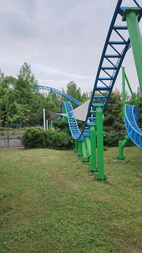 Fly Over Mediterranean at Happy Valley Chengdu has a rather unique and uncomfortable restraint/harness system, but the ride is still a phenomenal little power house. It's funny that the Vekoma SLC right next to it dwarfs it. This is an Intamin Mega-Lite layout. | Coaster Kings