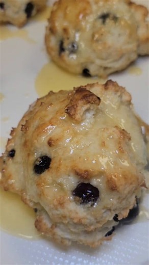 It's breakfast time and we have something tasty baking. I love drop biscuits for so many reasons and adding blueberries takes them to another level. Drizzle with a little honey butter and you have the perfwct quick and easy breakfast. #breakfastideas #dropbiscuits #quickrecipes | Lynnette's Cakes and Catering