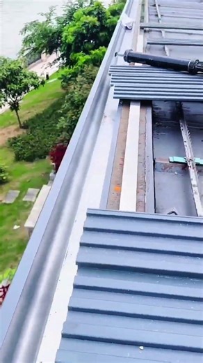 Hand aligning interlocking metal panels for assembly