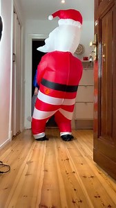 Creative Holiday Dance in Inflatable Santa Suit