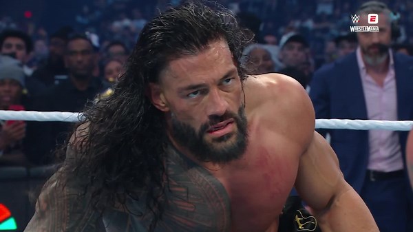 Roman Reigns outlasts CM Punk to win World Heavyweight Championship