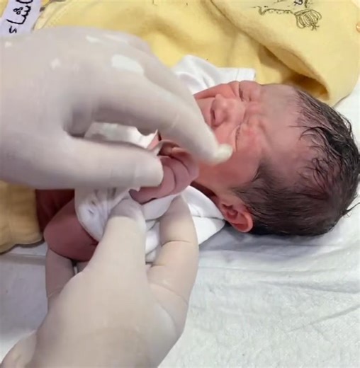 A cute little baby in NICU is getting ready for home 🏠 after recovery 💖. The nurse is preparing the baby with love and care, and the baby looks so adorable in a cute dress 👗. Truly a heartwarming moment from NICU to home. 🌸 | Caring Nurse