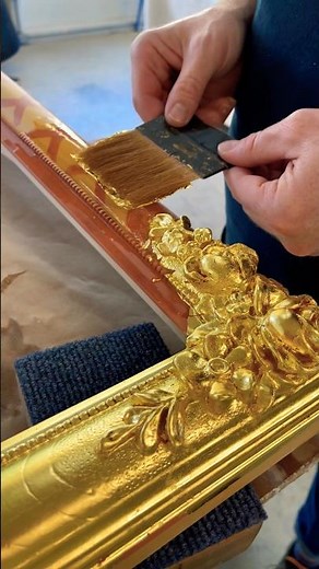 Laying gold leaf on a handmade frame #woodcarving #satisfying #art #gilding #gold #restoration #wood