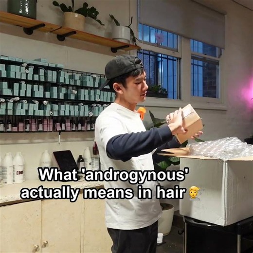 Joe explains the androgynous look: short feminine hair with a strong masculine edge.
