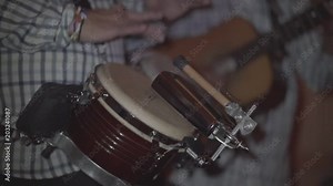 Concert of Cuban men with drums and guitars