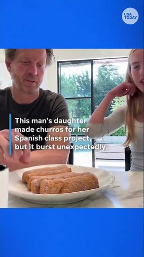 Watch as churro dad takes an explosive bite #Shorts