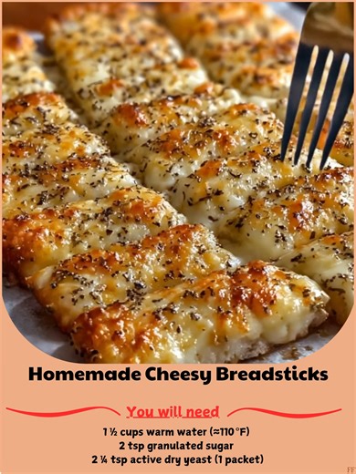 Homemade 🌕 Cheesy Breadsticks Ingredients Here’s everything you need to make these cheesy breadsticks: 1 ½ cups warm water (about 110°F/43°C) 2 teaspoons sugar 2 ¼ teaspoons active dry yeast (1 packet) 3 ½ cups all-purpose flour 2 tablespoons olive oil (plus extra for greasing) ..... Full Recipe in Coʍmеոτ 💬 ⚡ | Family Meal Recipes